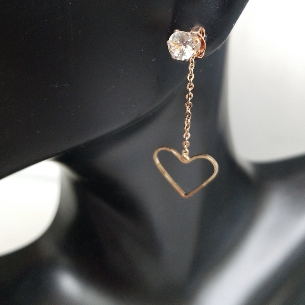 New mismatched pair of earrings. It's the style!